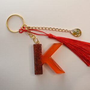 Llavero letra K naranja
