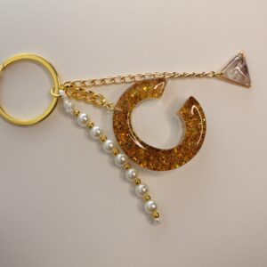 Llavero letra C dorado