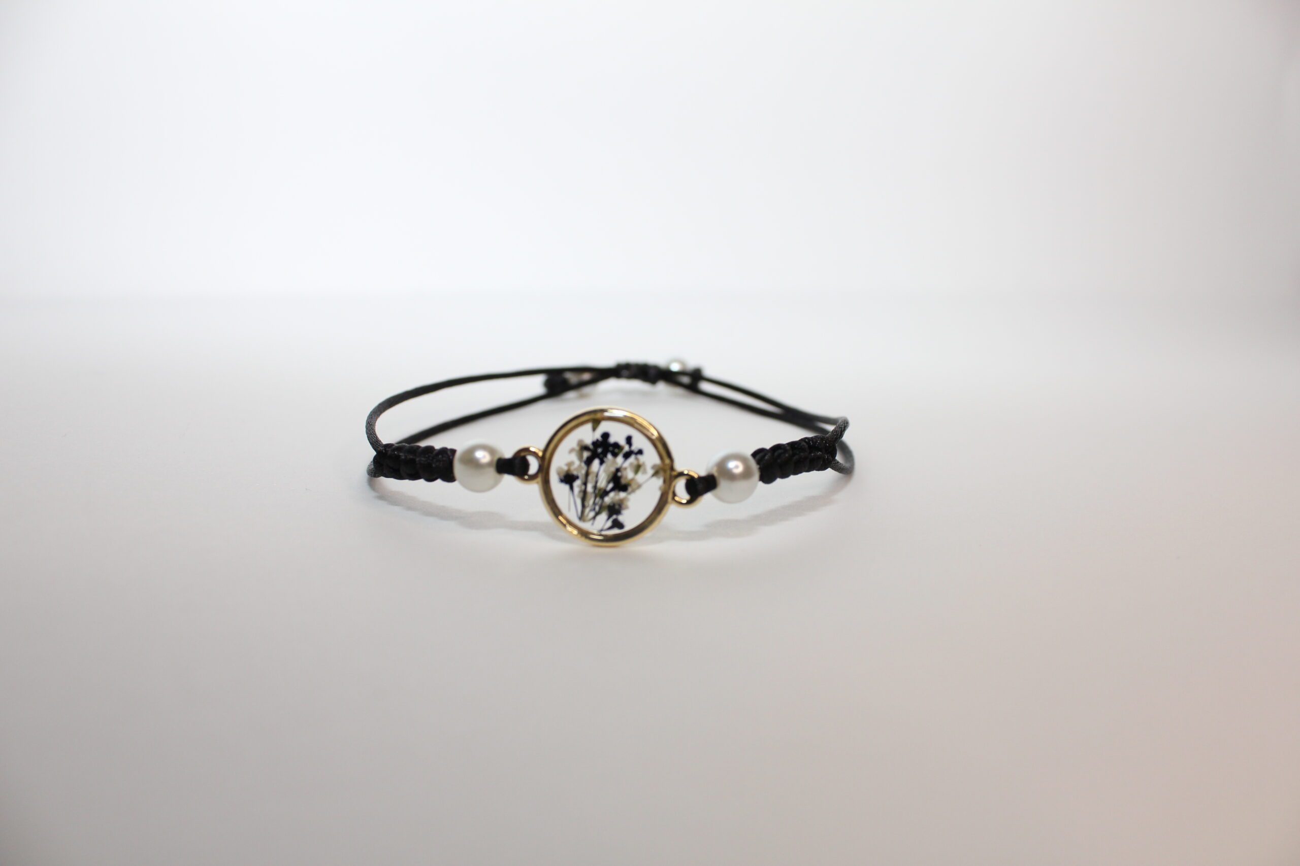 Pulsera negra charm flores - Imagen 3