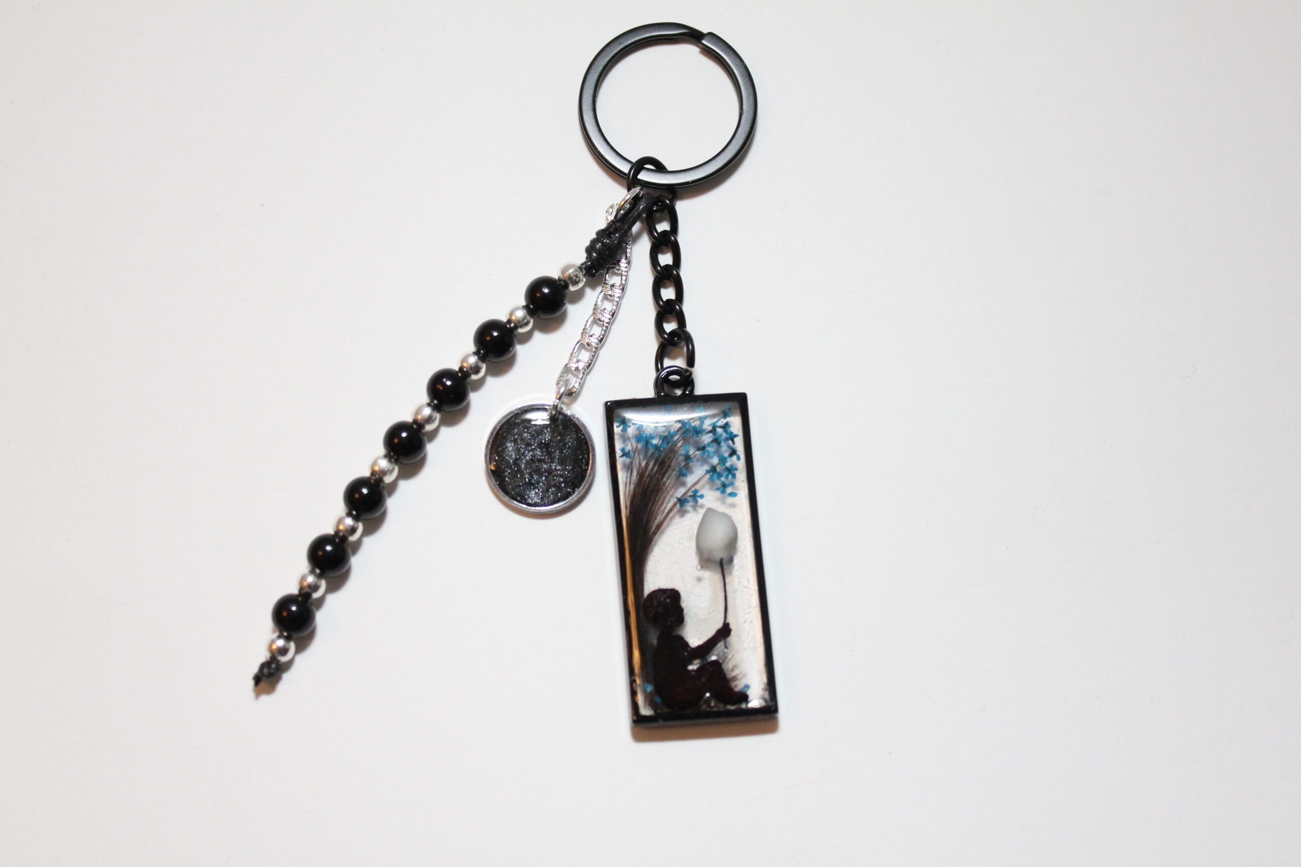 Llavero diente de leche y cabello